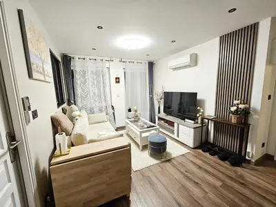 Télévision ou salle de divertissement dans l'établissement Your cozy cove by Paris