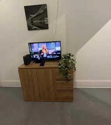 Télévision ou salle de divertissement dans l'établissement CHAMPS ELYSEES No 76