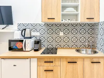 Cuisine ou kitchenette dans l'établissement Marais - Canal st Martin 20m2