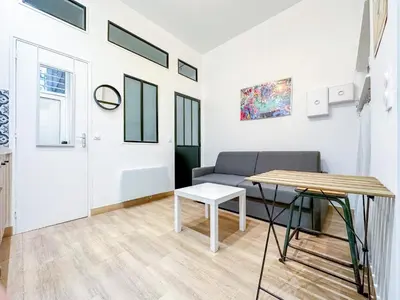 Coin salon dans l'établissement Marais - Canal st Martin 20m2