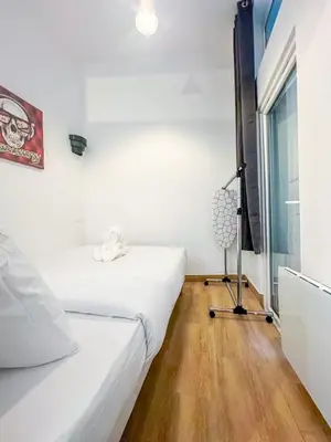 Un ou plusieurs lits dans un hébergement de l'établissement Marais - Canal st Martin 20m2