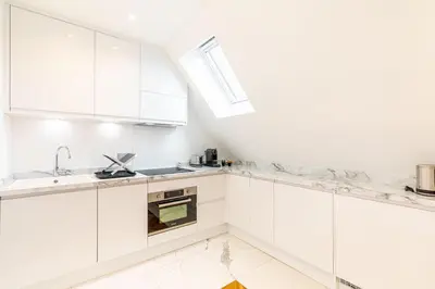 Cuisine ou kitchenette dans l'établissement GuestReady - Appartement Grenelle