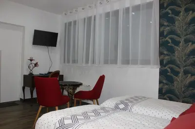 Un ou plusieurs lits dans un hébergement de l'établissement PARIS de FLORE Stane