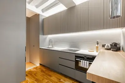 Cuisine ou kitchenette dans l'établissement La Suite Parisienne
