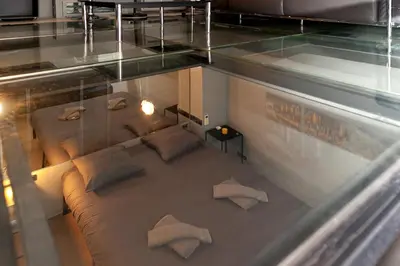 Un ou plusieurs lits dans un hébergement de l'établissement Loft atypique avec terrasse, calme et cosy
