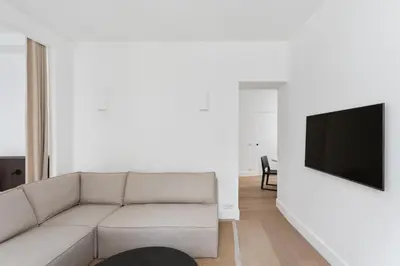 Télévision ou salle de divertissement dans l'établissement Adresse Prestigieuse: Appartement Luxueux Marais
