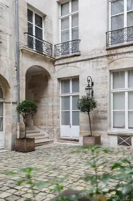 Jardin de l'établissement Adresse Prestigieuse: Appartement Luxueux Marais