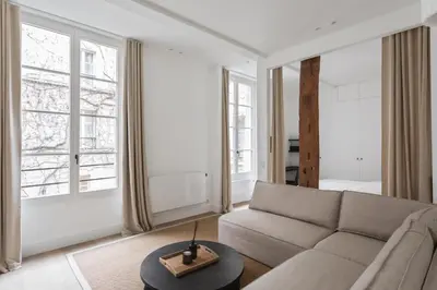 Coin salon dans l'établissement Adresse Prestigieuse: Appartement Luxueux Marais