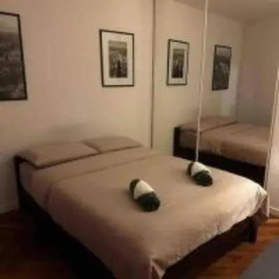 Un ou plusieurs lits dans un hébergement de l'établissement Parisian apartment for 6 pers Paris by askmefrance
