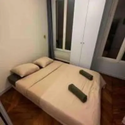 Un ou plusieurs lits dans un hébergement de l'établissement Parisian apartment for 6 pers Paris by askmefrance