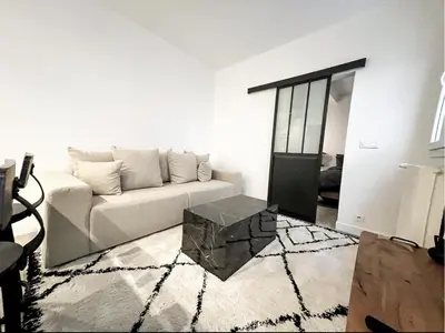 Coin salon dans l'établissement Suite luxueuse avec jardin privatif et jacuzzi