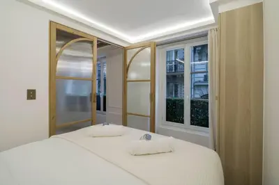Un ou plusieurs lits dans un hébergement de l'établissement Suite Royale # Palais de l'Elysée # Paris 8