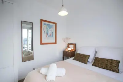 Un ou plusieurs lits dans un hébergement de l'établissement Heavenly & Cozy Parisian Flat - Place Voltaire