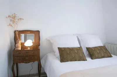 Un ou plusieurs lits dans un hébergement de l'établissement Heavenly & Cozy Parisian Flat - Place Voltaire