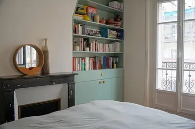 Un ou plusieurs lits dans un hébergement de l'établissement Family flat, 15' away from Paris city center