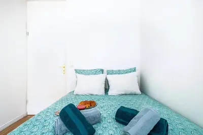 Un ou plusieurs lits dans un hébergement de l'établissement Cosy & Spacieux, Paris 10 min + Parking privé.