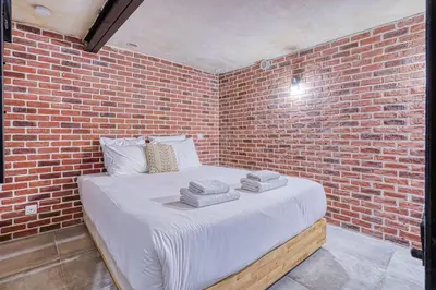 Un ou plusieurs lits dans un hébergement de l'établissement Appartement proche Rue de Charonne - II