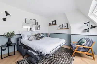 Un ou plusieurs lits dans un hébergement de l'établissement Brand New Luxury Flat in Champs Elysees - Triangle d'Or