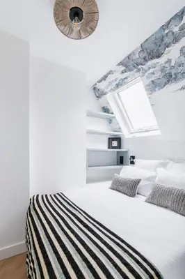Un ou plusieurs lits dans un hébergement de l'établissement Brand New Luxury Flat in Champs Elysees - Triangle d'Or