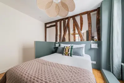 Un ou plusieurs lits dans un hébergement de l'établissement Brand New Luxury Flat in Parc Monceau - Batignolles