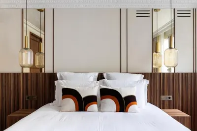 Un ou plusieurs lits dans un hébergement de l'établissement HIGHSTAY - Luxury Serviced Apartments - Centre Pompidou
