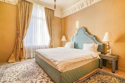 Un ou plusieurs lits dans un hébergement de l'établissement Marrakech Suite Champs Elysees