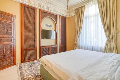 Un ou plusieurs lits dans un hébergement de l'établissement Marrakech Suite Champs Elysees