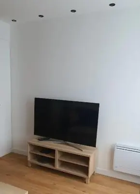 Télévision ou salle de divertissement dans l'établissement Chez vous au coeur de Paris Convention - Vaugirard