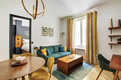 Coin salon dans l'établissement Séjours Parisiens / Suite Belle Courcelles / 4*