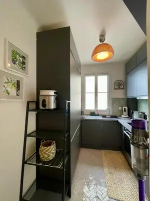 Cuisine ou kitchenette dans l'établissement AIR CONDITIONING - METRO 14 - CHARMING TRADITIONAL STYLE AND MODERN ACCESS 10 MN AWAY FROM CENTER Of PARIS