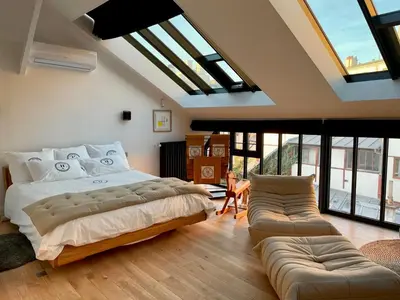 Un ou plusieurs lits dans un hébergement de l'établissement NEW : Atelier Artiste Montmartre