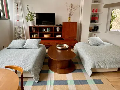 Un ou plusieurs lits dans un hébergement de l'établissement NEW : Atelier Artiste Montmartre