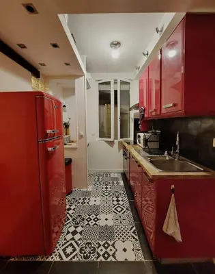 Cuisine ou kitchenette dans l'établissement Appartement au coeur de Ménilmontant