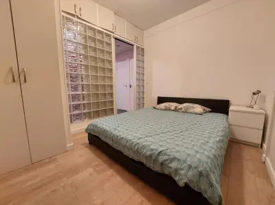 Un ou plusieurs lits dans un hébergement de l'établissement Appartement au coeur de Ménilmontant