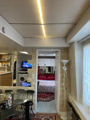 Un ou plusieurs lits dans un hébergement de l'établissement Paris roquette appartement 1 chambre