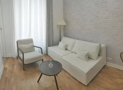 Coin salon dans l'établissement Stylish Parisian Flat near Eiffel Tower