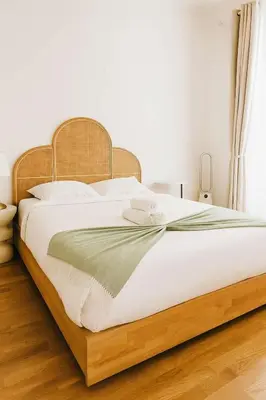 Un ou plusieurs lits dans un hébergement de l'établissement Stylish Parisian Flat near Eiffel Tower