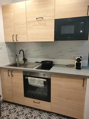 Cuisine ou kitchenette dans l'établissement Stylish Parisian Flat near Eiffel Tower