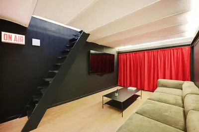 Coin salon dans l'établissement Charming Flat, quartier latin with a private cinema