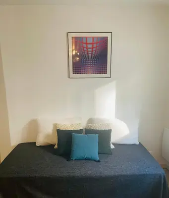 Un ou plusieurs lits dans un hébergement de l'établissement Beautiful 45 m2 private apartment in Paris Montparnasse