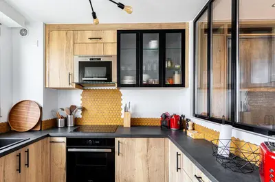 Cuisine ou kitchenette dans l'établissement GuestReady - Studio Chic avec Vue Panoramique
