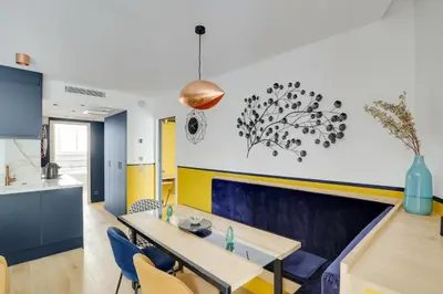 Coin salon dans l'établissement Séjours Parisiens / Suite Étoile / 5*