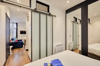 Un ou plusieurs lits dans un hébergement de l'établissement Rent a Room apartments - Alma