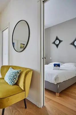 Un ou plusieurs lits dans un hébergement de l'établissement Rent a Room apartments - Alma