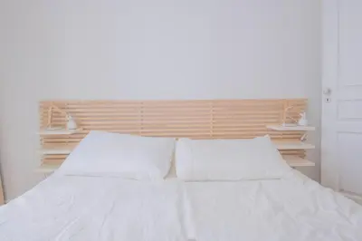 Un ou plusieurs lits dans un hébergement de l'établissement We Parisian The Latin Quarter Cozy Home