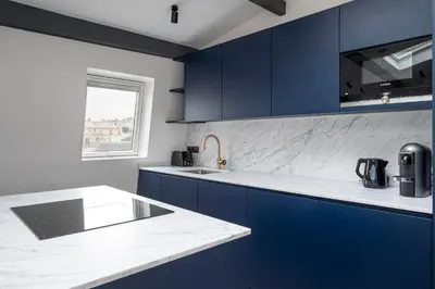 Cuisine ou kitchenette dans l'établissement Saint Germain Residence