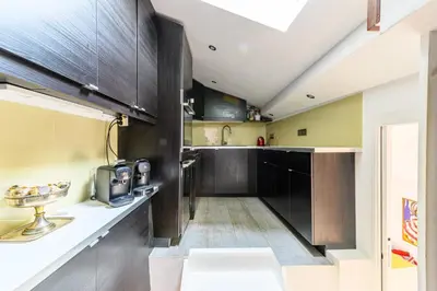 Cuisine ou kitchenette dans l'établissement Appartement Sauval - Welkeys
