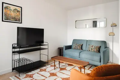Télévision ou salle de divertissement dans l'établissement Residence Clichy - Dagobert