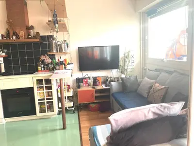 Télévision ou salle de divertissement dans l'établissement Family Friends