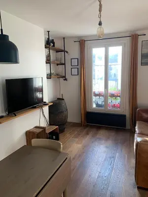 Télévision ou salle de divertissement dans l'établissement L'appart sur le canal
